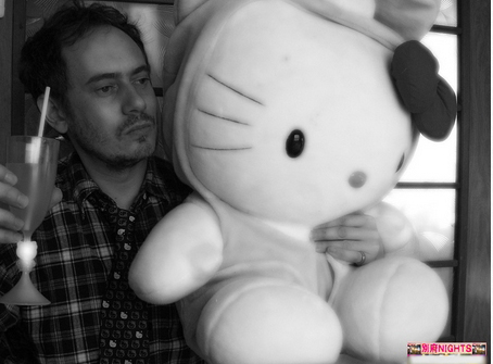Gilles with his friend and accomplice, Hello Kitty