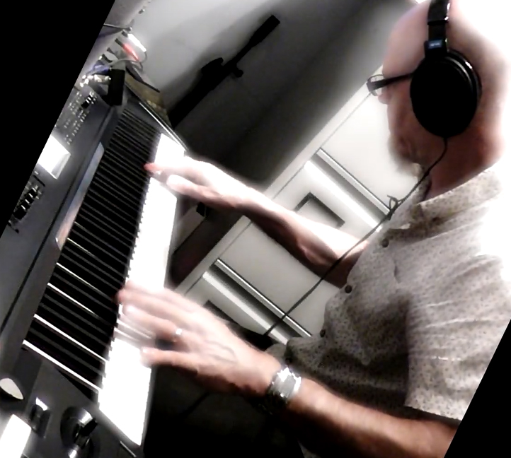 Tim Brown of Blurred Turtle plays a keyboard