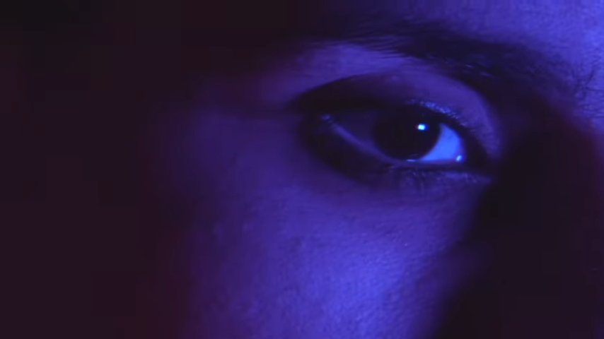 Screenshot of the a closeup of the eye of the vocalist of Violet Silhouette, from their new video "Hierda Demoniaca."